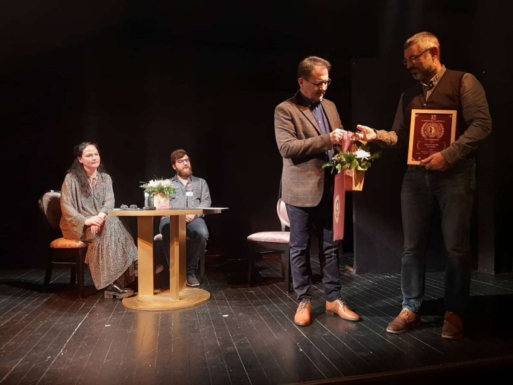 Prof. Nedyalko Delchev’s play “Freckles” Awarded at the 12th National Competition for Bulgarian Drama featured image